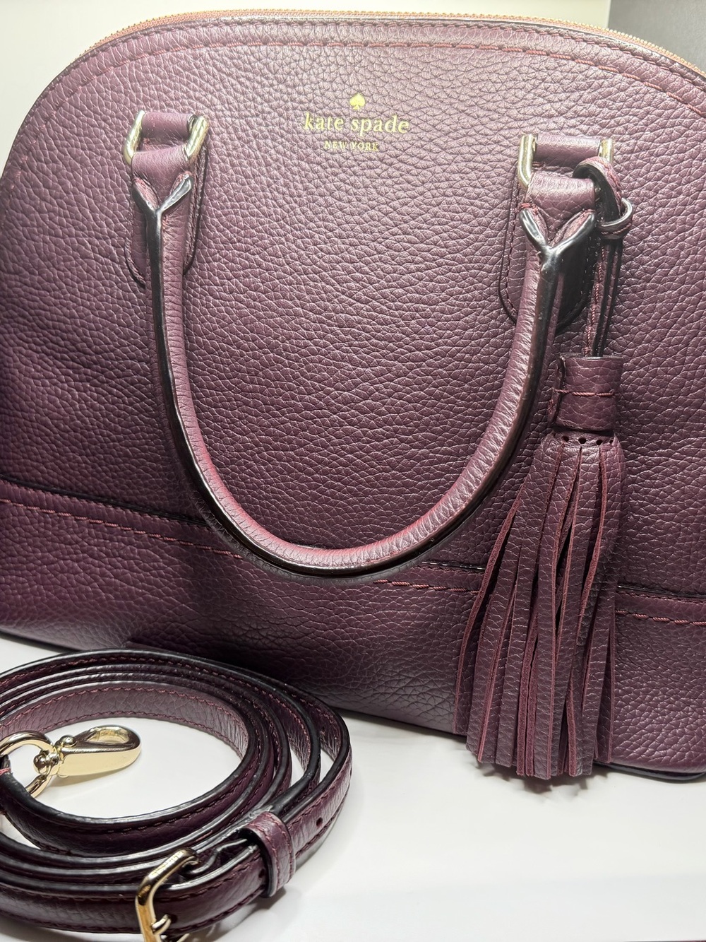 kate spade plum leather satchel with tassel